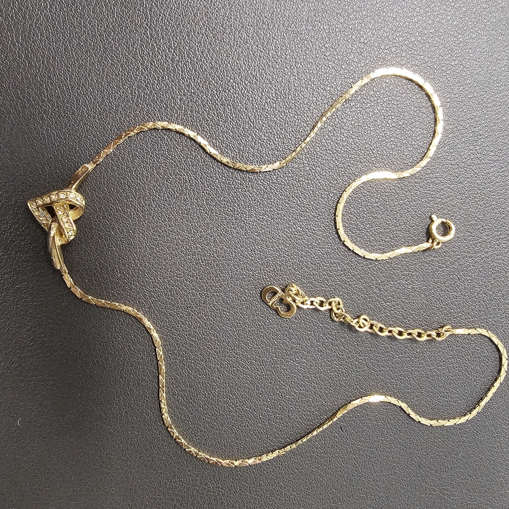 Dior Gold Heart Knot Pendant Necklace - Gold Tone